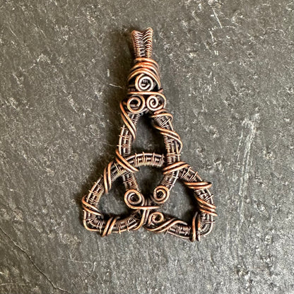 Threefold Gate — Woven Copper Triquetra