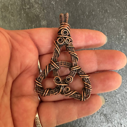 Threefold Gate — Woven Copper Triquetra